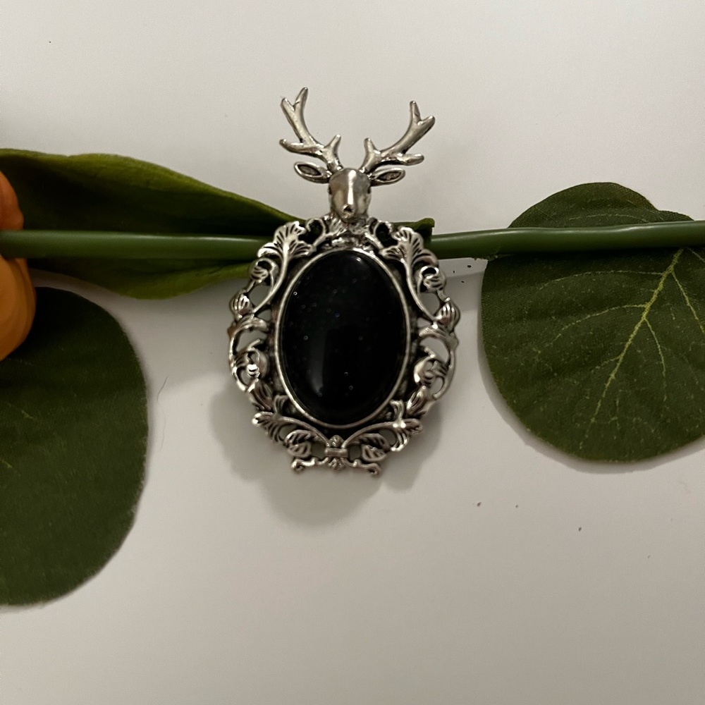 Blue sandstone deer pendant (comes with silver plated chain).